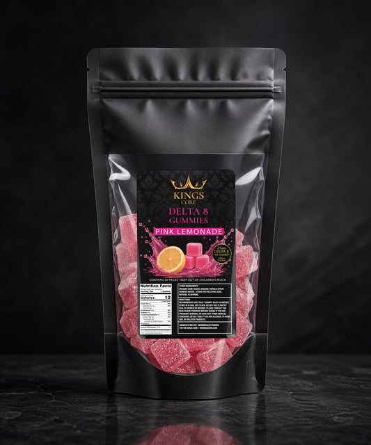 Black packaging of pink lemonade gummies with visible branding on a dark background