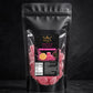 Black packaging of pink lemonade gummies with visible branding on a dark background